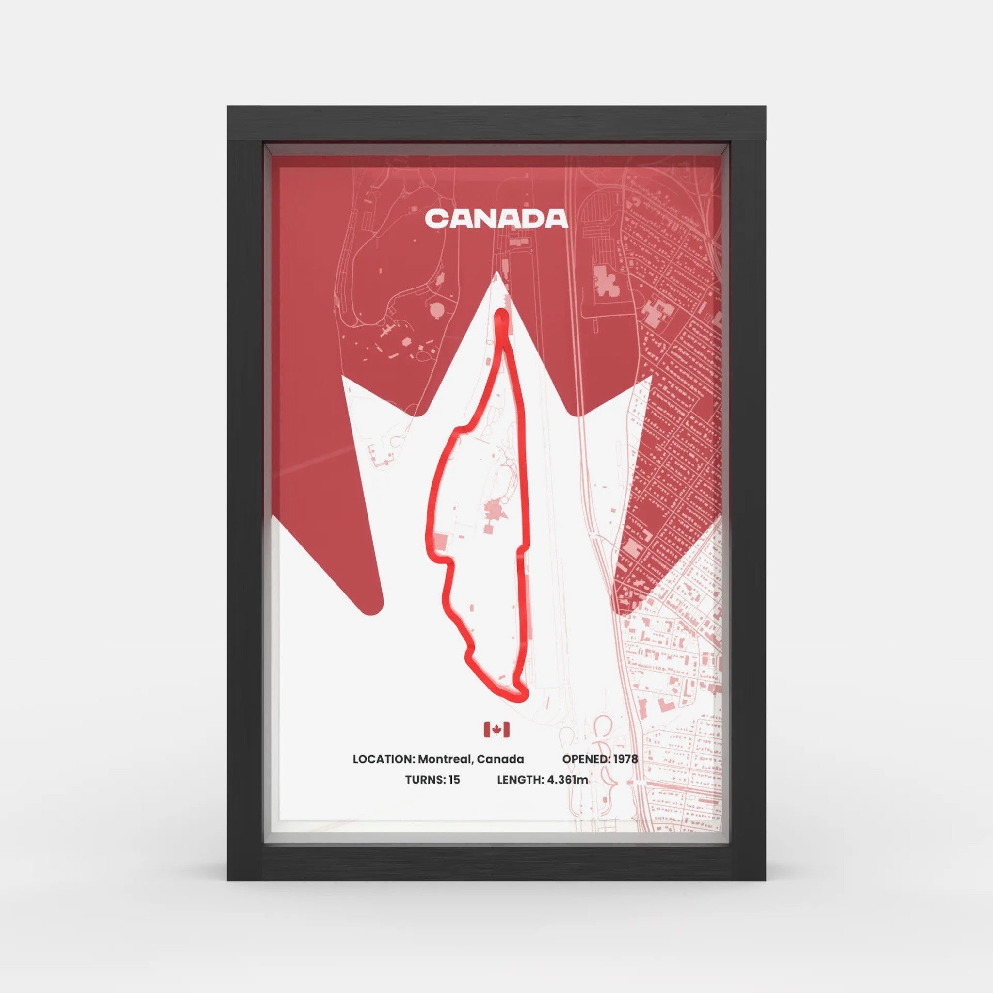 A framed poster featuring a stylized red and white map of Canada with the word CANADA at the top and track details at the bottom, shown in a black frame against a light gray background.