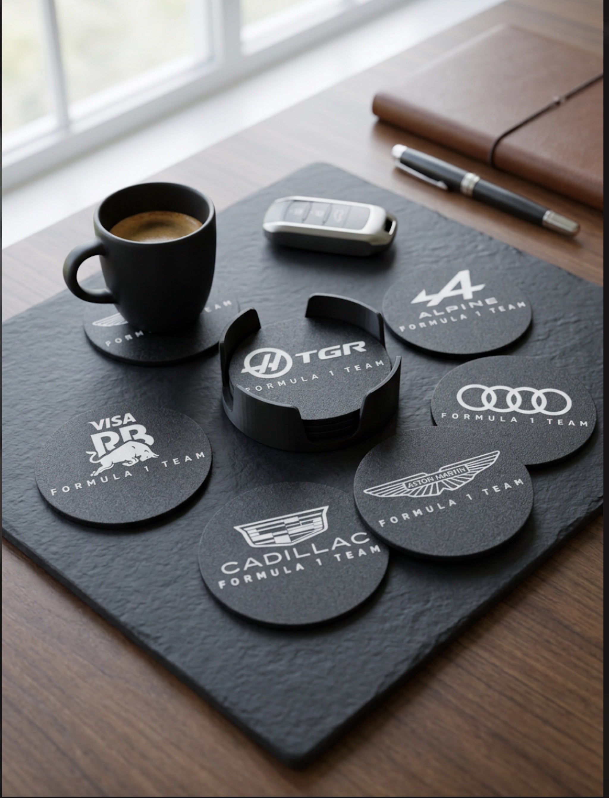 Angled view of Formula 1 coasters set with 3D printed holder on wooden desk showing depth and premium finish