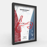 A framed Zandvoort motorsport map print with a red track outline, shown at an angle against a light gray background. The print features a black frame and includes text such as 'ZANDVOORT', 'Netherlands', and track details.
Dutch Grand Prix track framed wall art front view