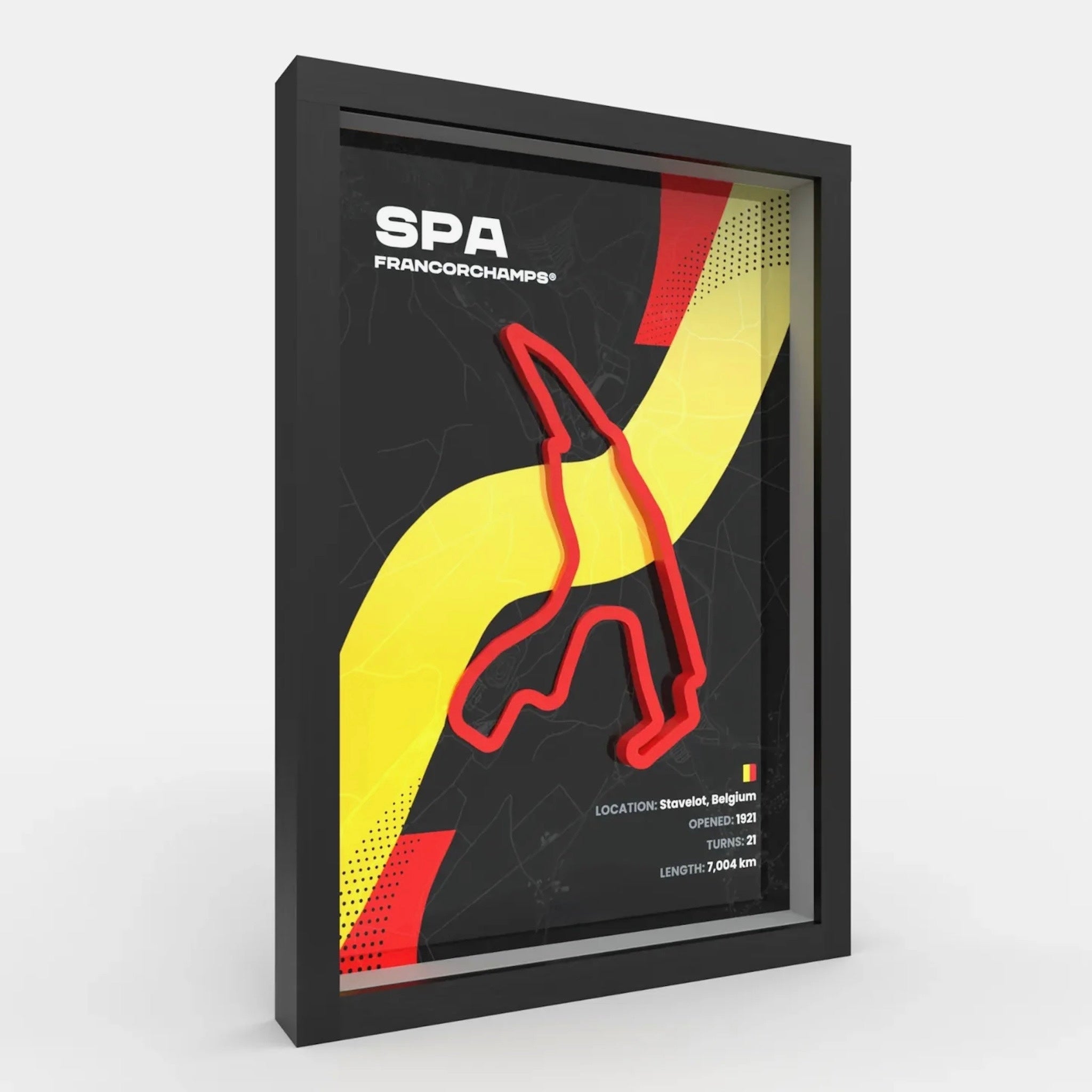 A framed racing track poster featuring the Spa Francorchamps circuit in Belgium. The design has a black background with a bold yellow and red abstract graphic and white text reading 'SPA FRANCORCHAMPS' and track details.
Spa Francorchamps F1 track framed wall art front view